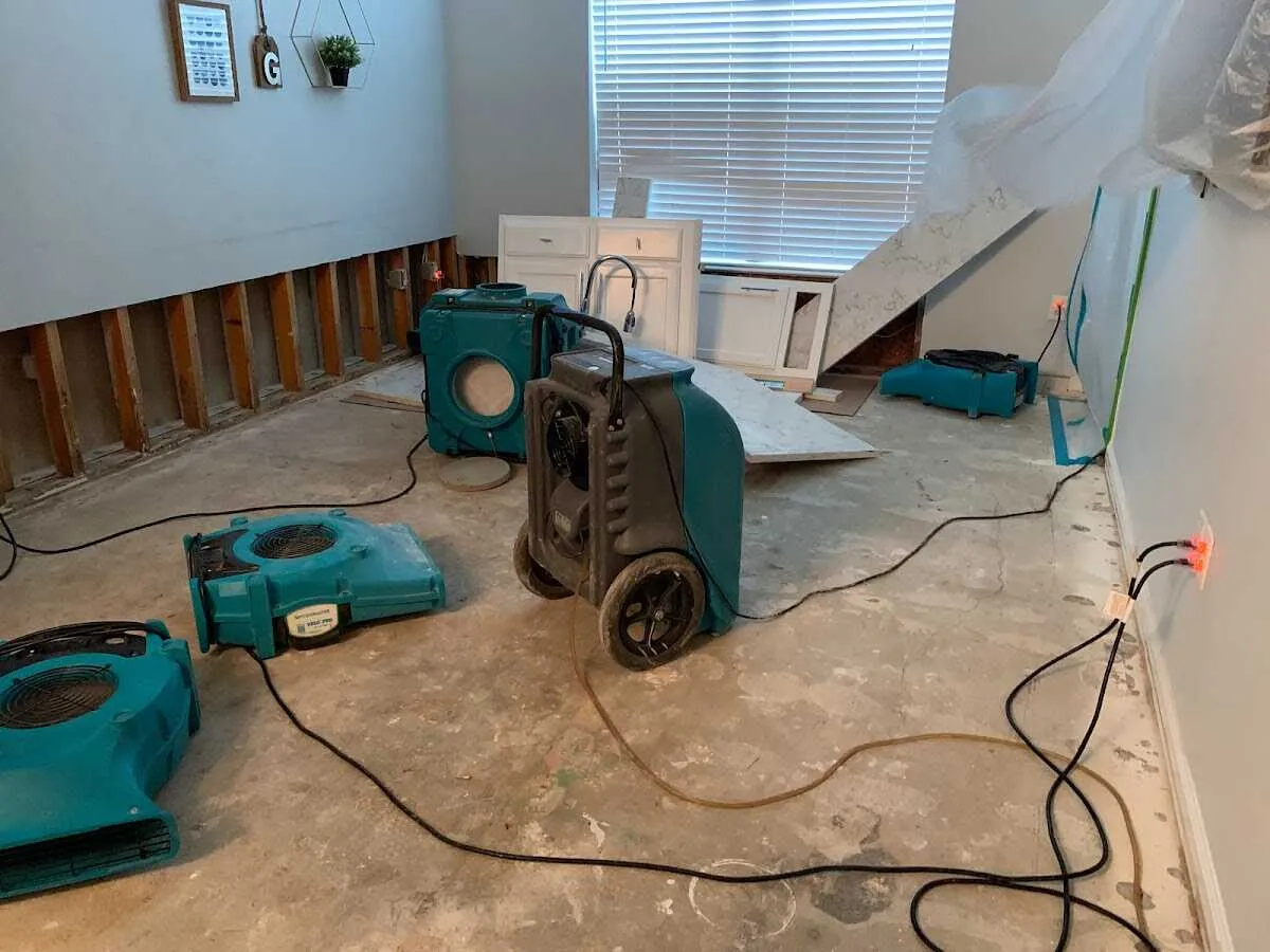 Dehumidifier in flood-cut room for Water Damage Restoration in Palm Springs